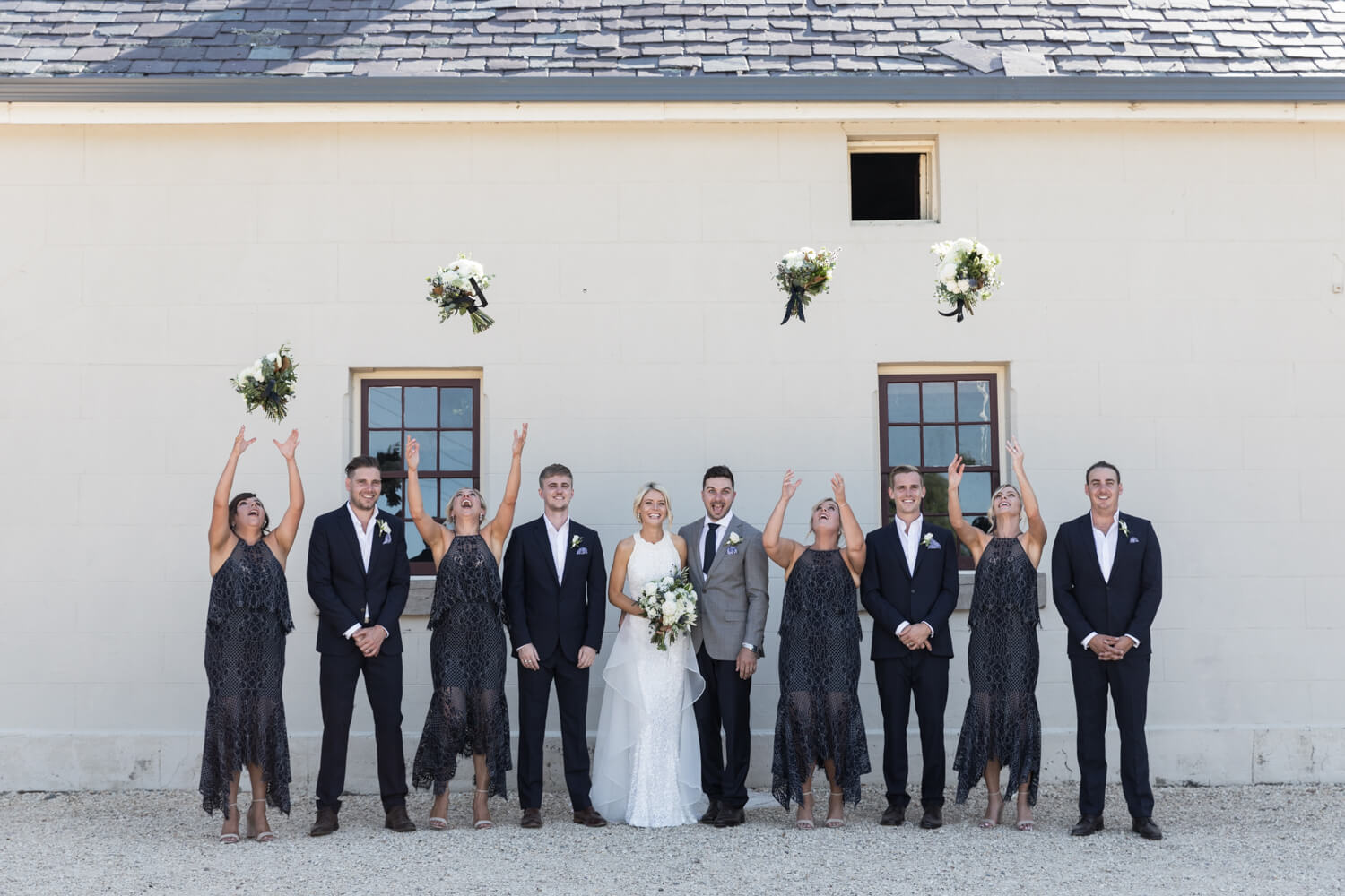 a group shot of the bridal party for their wallalong house wedding