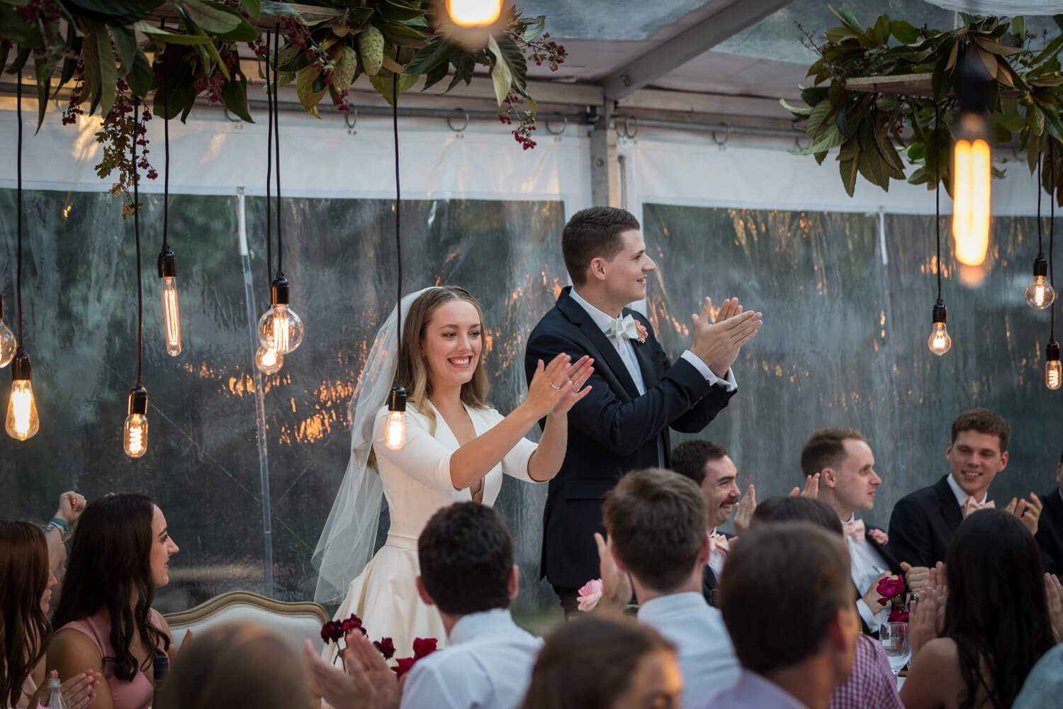 bride and groom clapping