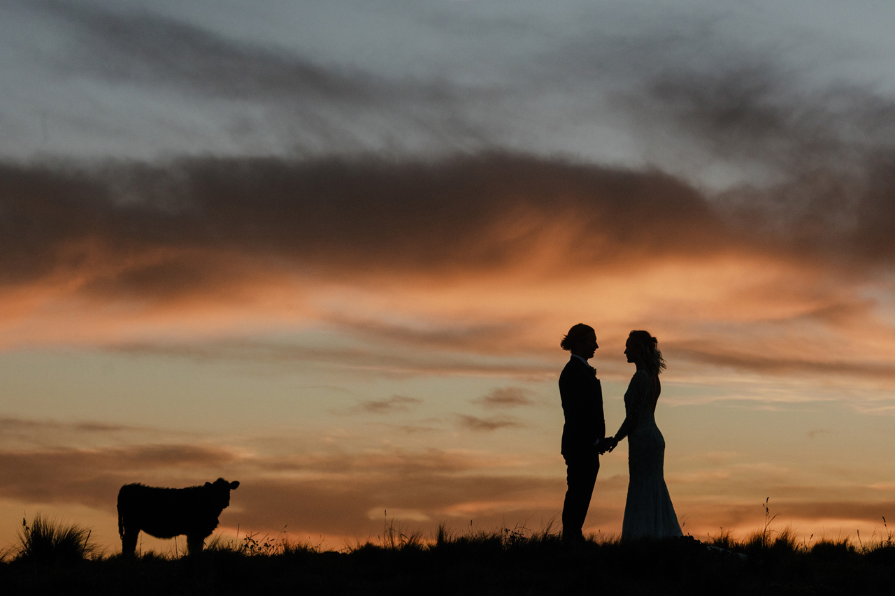 two people holding hands at this southern highland wedding venues