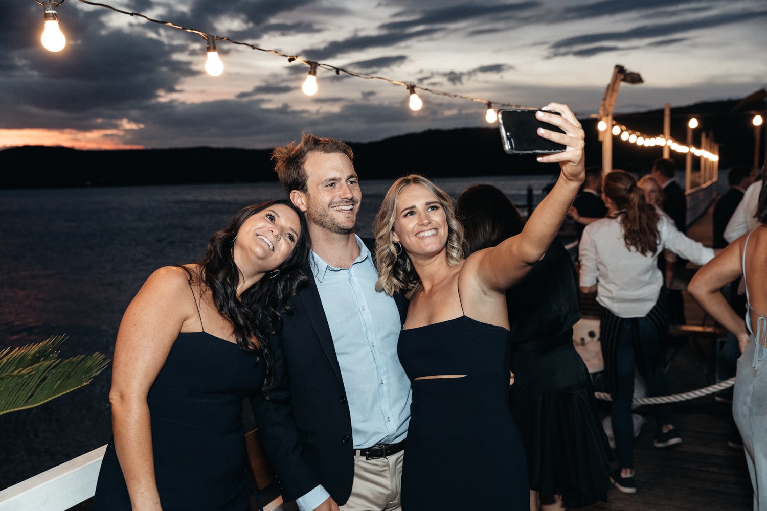 guests taking a selfie - palm beach wedding