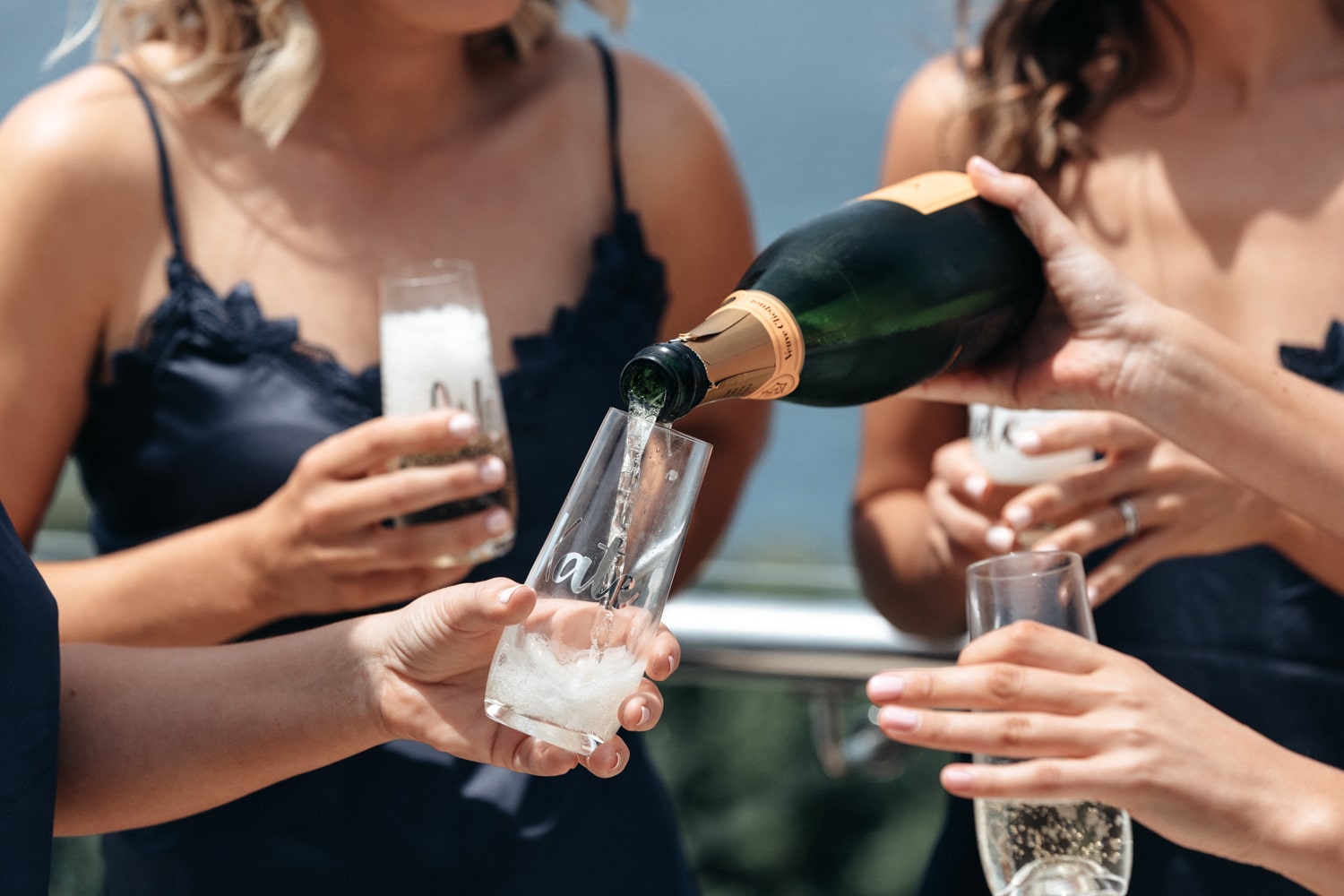 pour the bubbles into a glass - palm beach wedding