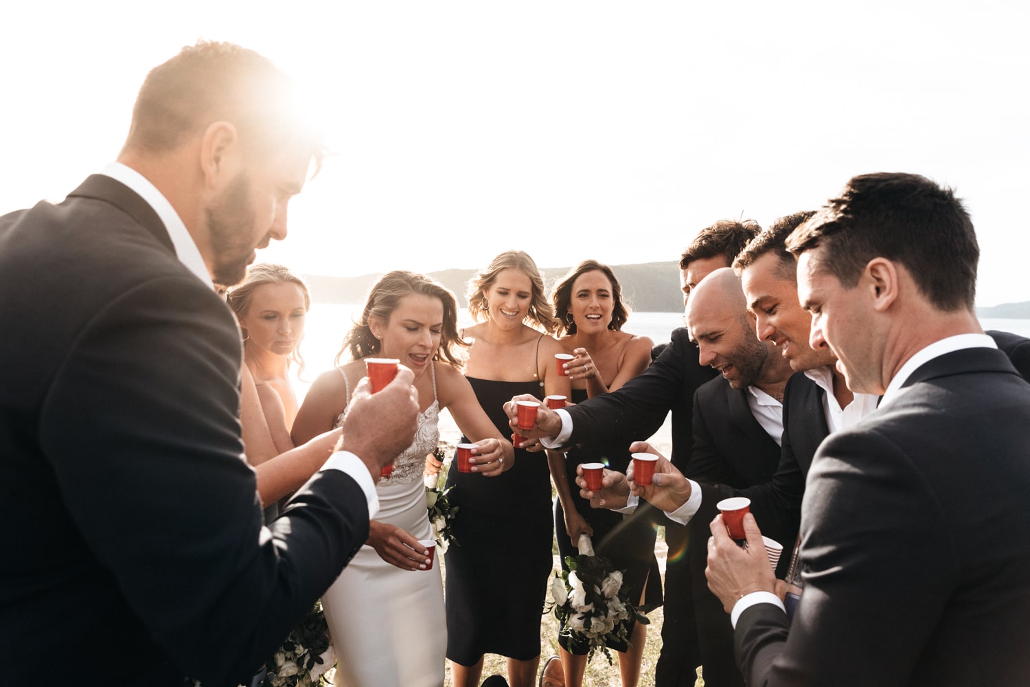 the bridal party doing shots - palm beach wedding