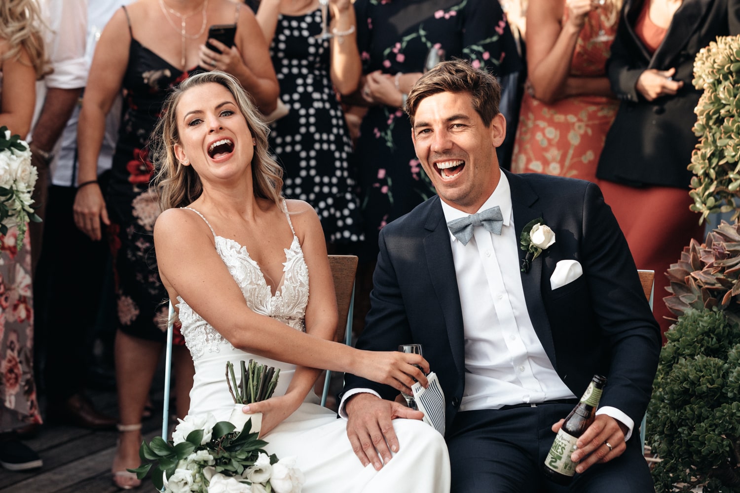 bride and groom laughing - palm beach wedding
