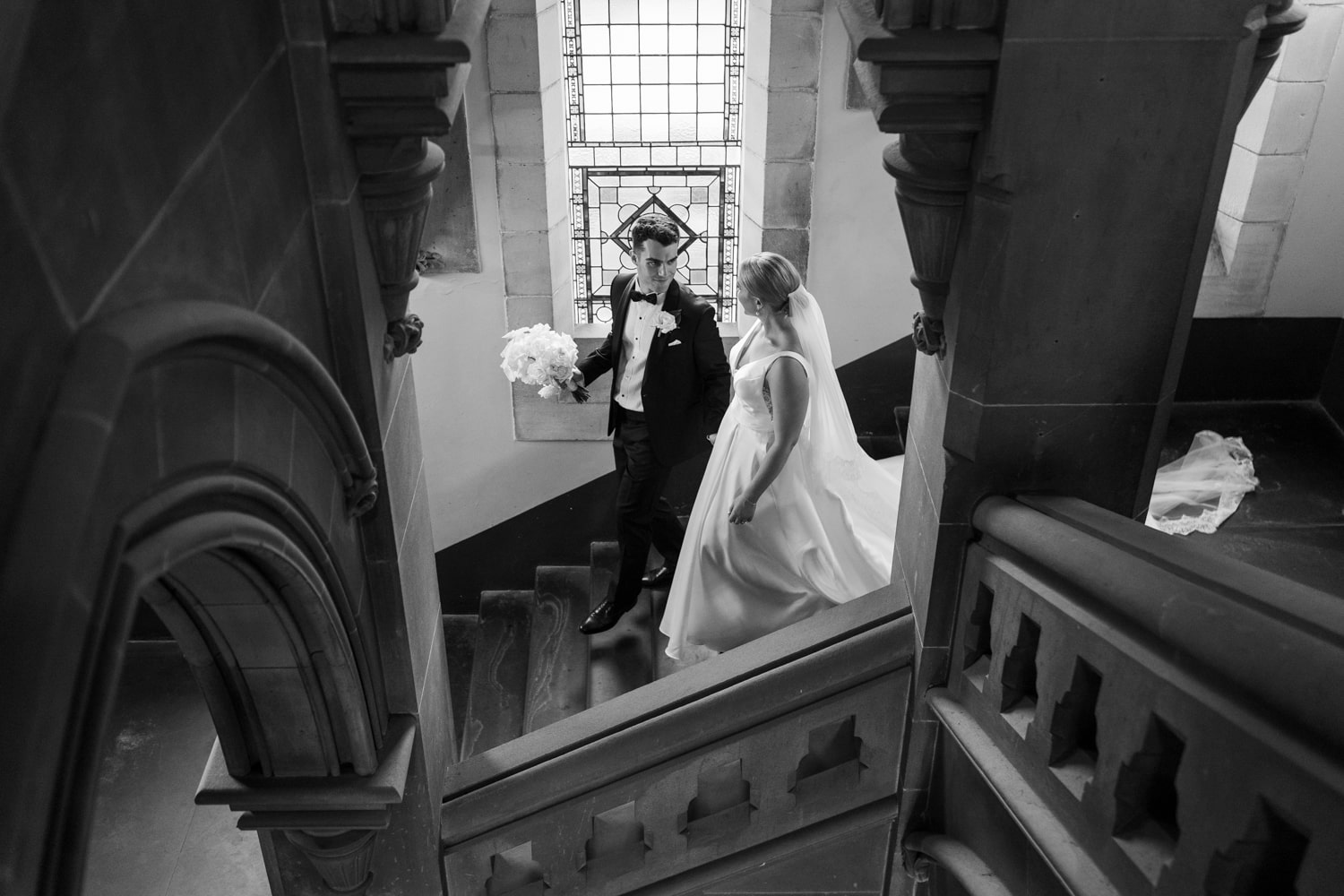 couple walking down the stairs at Manly Castle Sydney