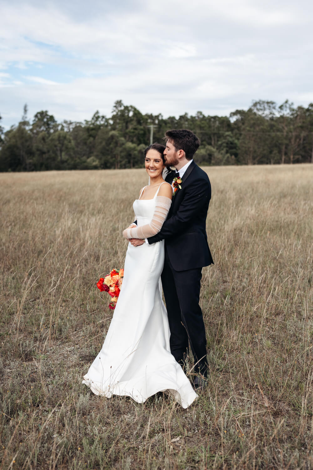couple in the squire's vineyard field