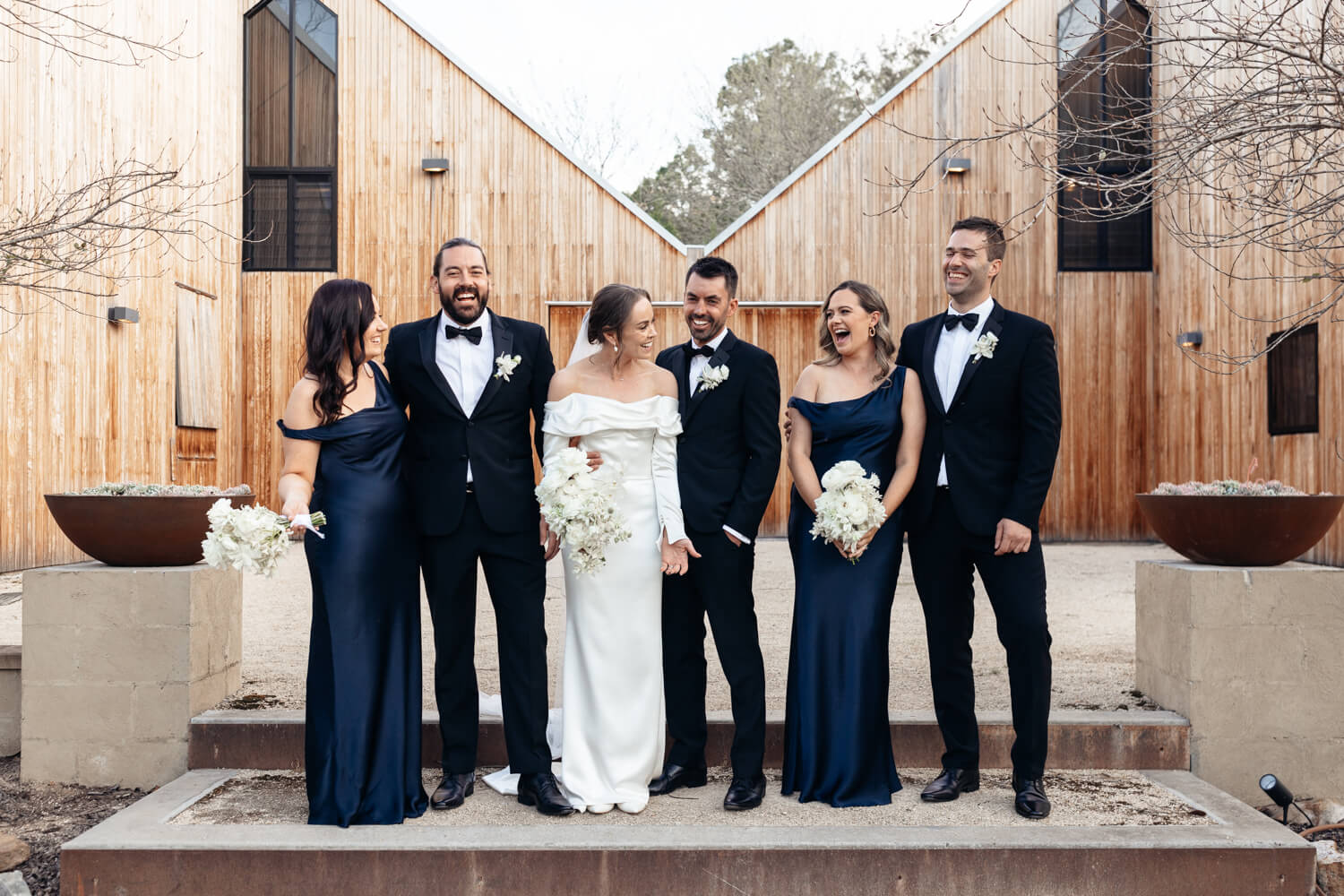 bridal party on the stairs at their woodhouse wollombi wedding