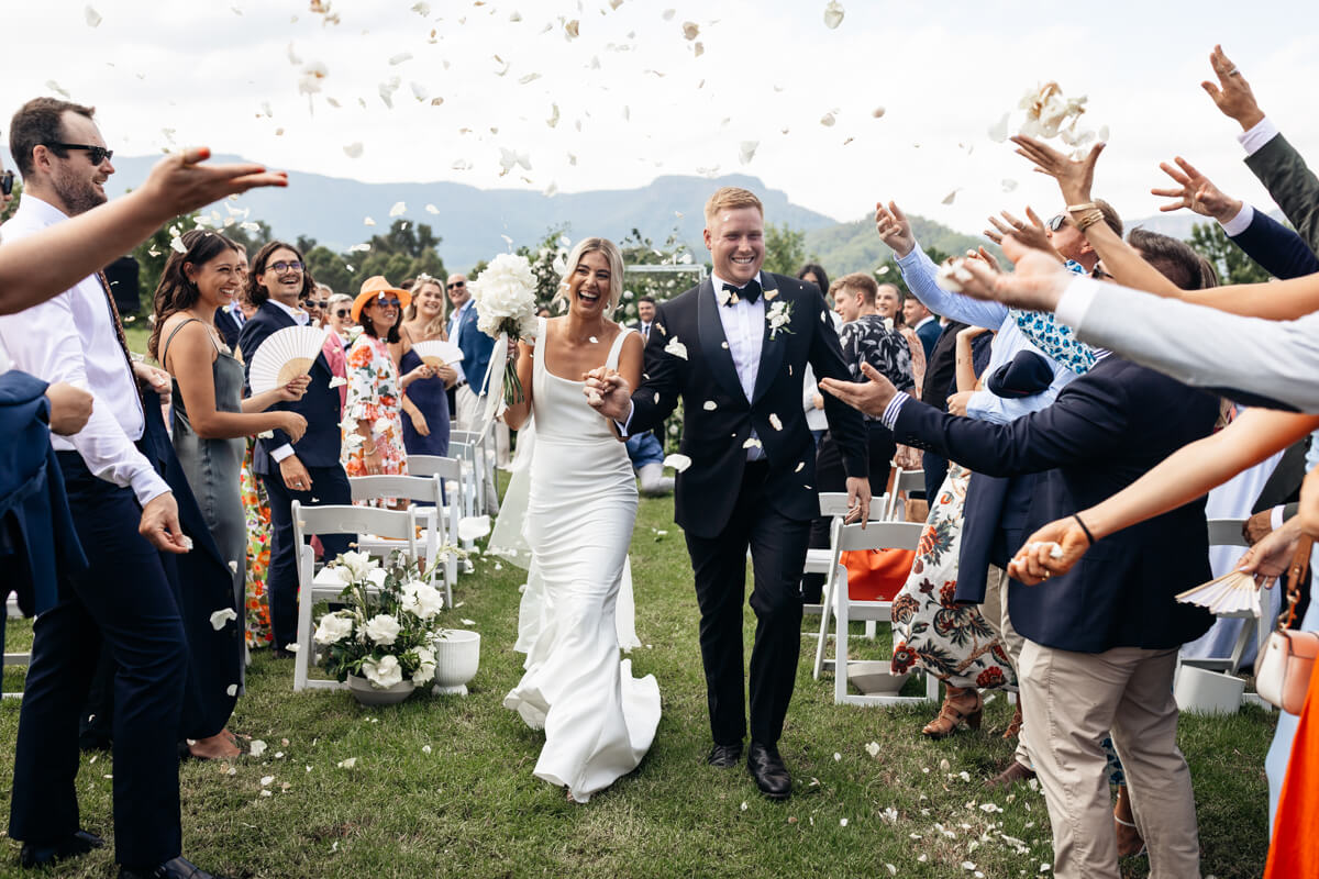lachlan and charlotte walking down the aisle at their kangaroo valley wedding
