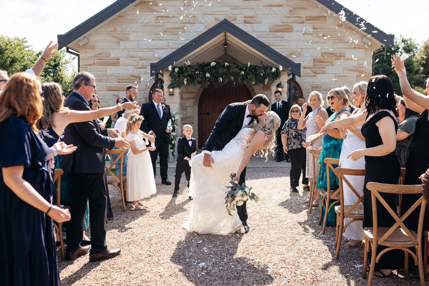 ceremony in front of the chapel at a peterson house wedding