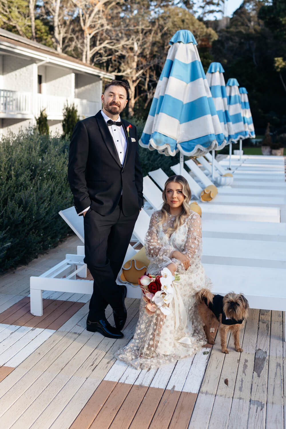 a posed portrait with the bird and groom at their lodge Jamberoo wedding