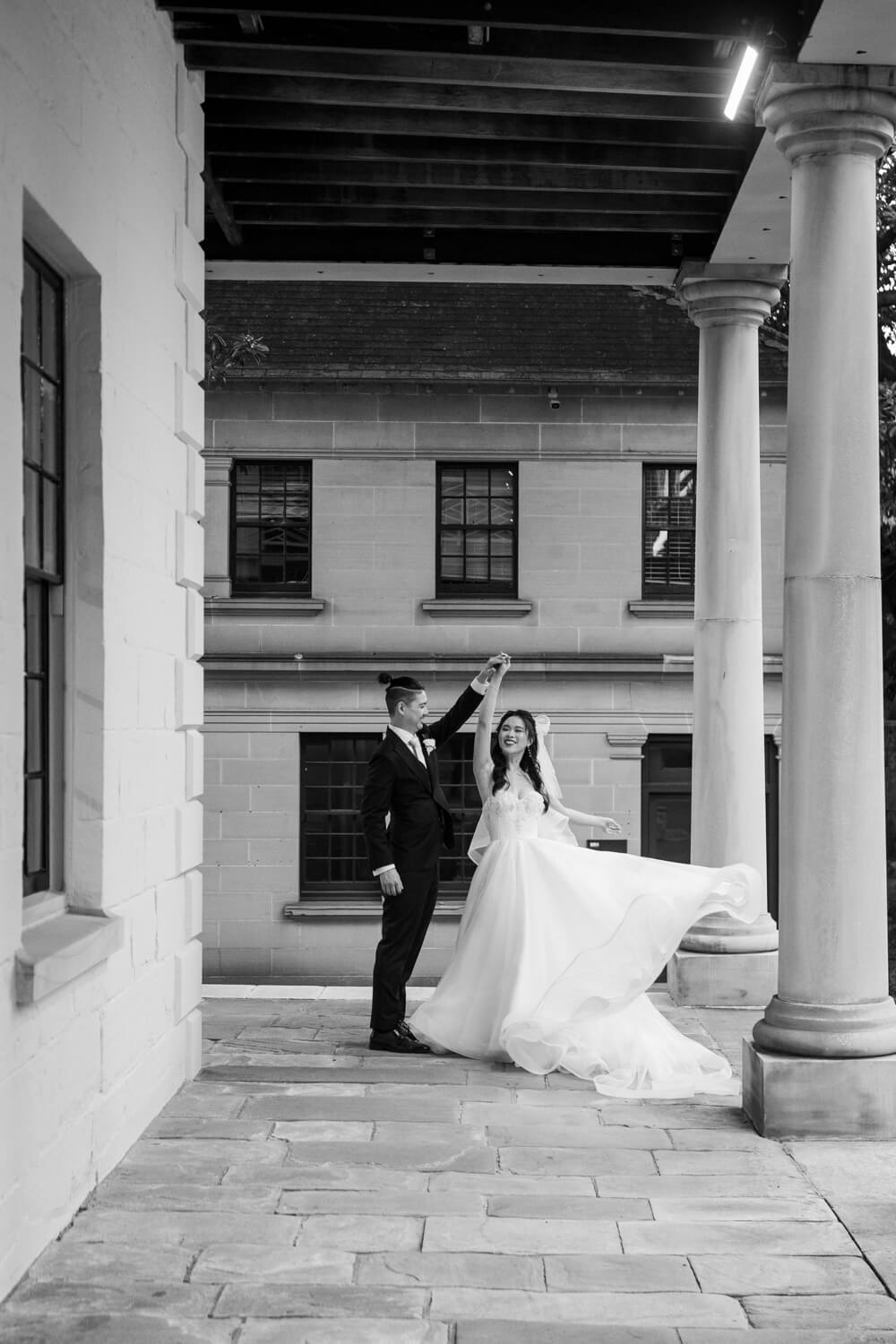 Bride and groom dancing at The Mint towards the end of their wedding portraits