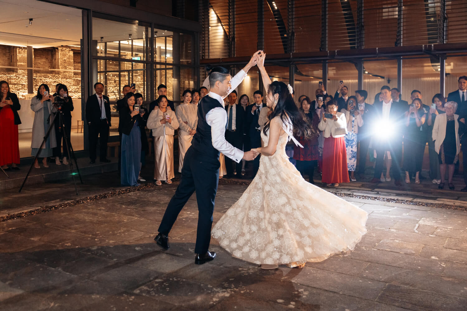 Bride and groom doing their first dance in front of their guests at The Mint