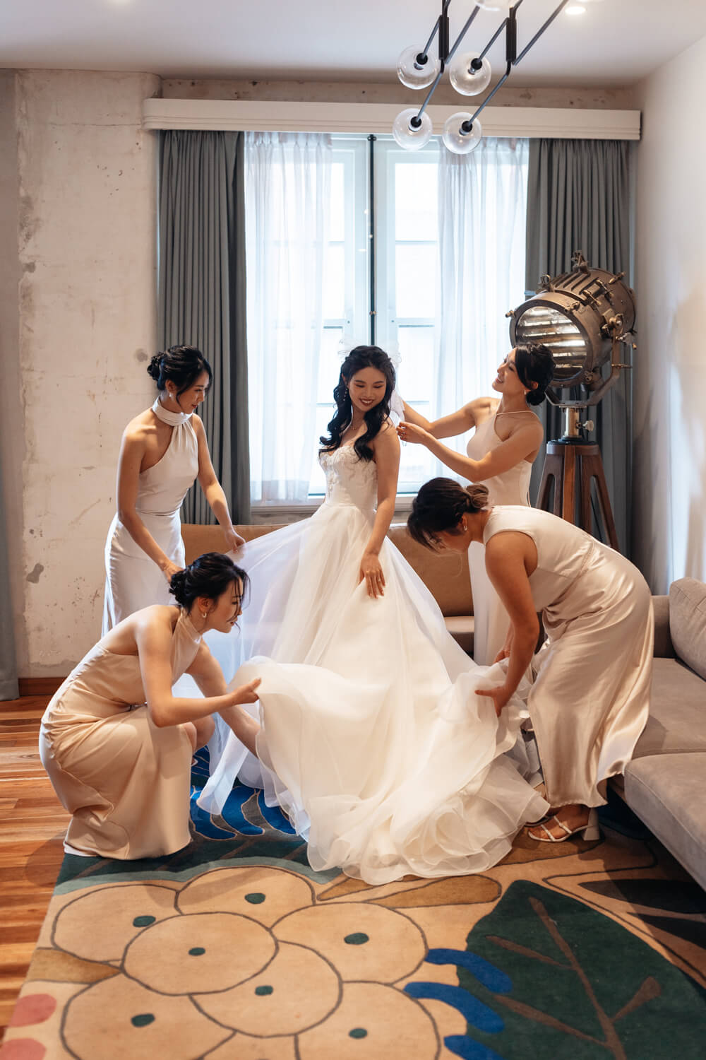 All the bridesmaids helping the bride get ready at The Old Clare Hotel in Sydney