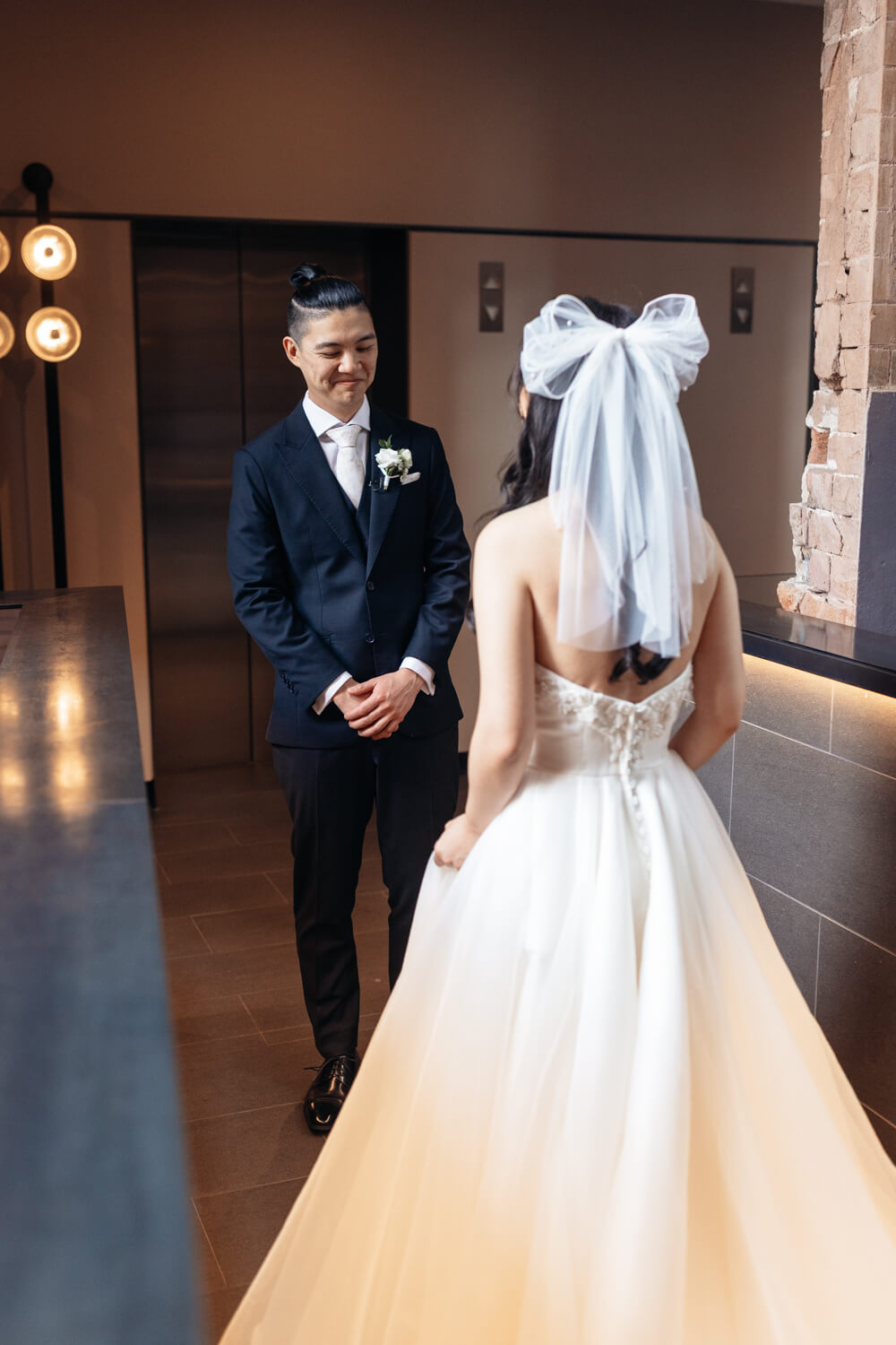 A first look with the bride and groom at The Old Clare Hotel in Sydney for their wedding