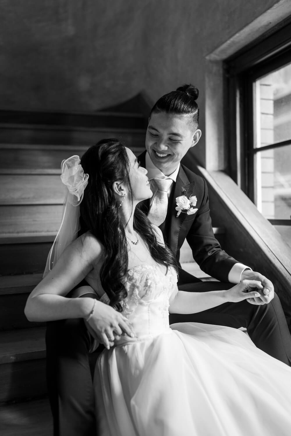 Bride and groom smiling at The Old Clare Hotel on their wedding day
