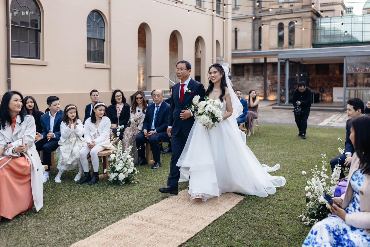 Bride walking down the aisle at The Mint Wedding